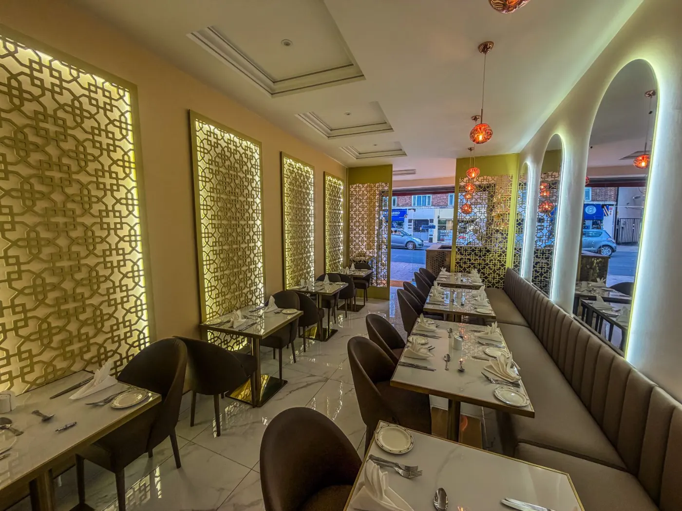 Backlit CNC-cut MDF wall panels with LED lighting in a Streatham restaurant